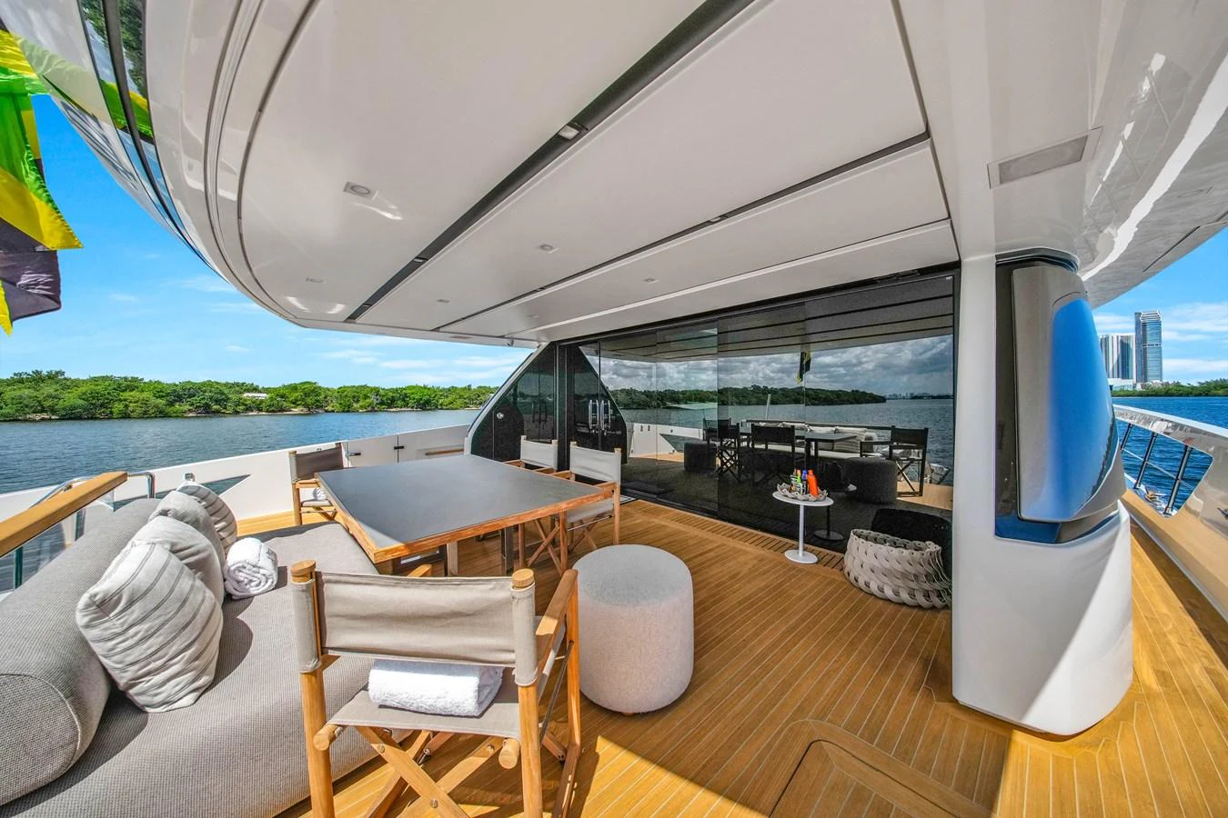 The aft deck offers a spacious and inviting area for outdoor dining and relaxation with stunning views. aboard AIDA Yacht for Sale