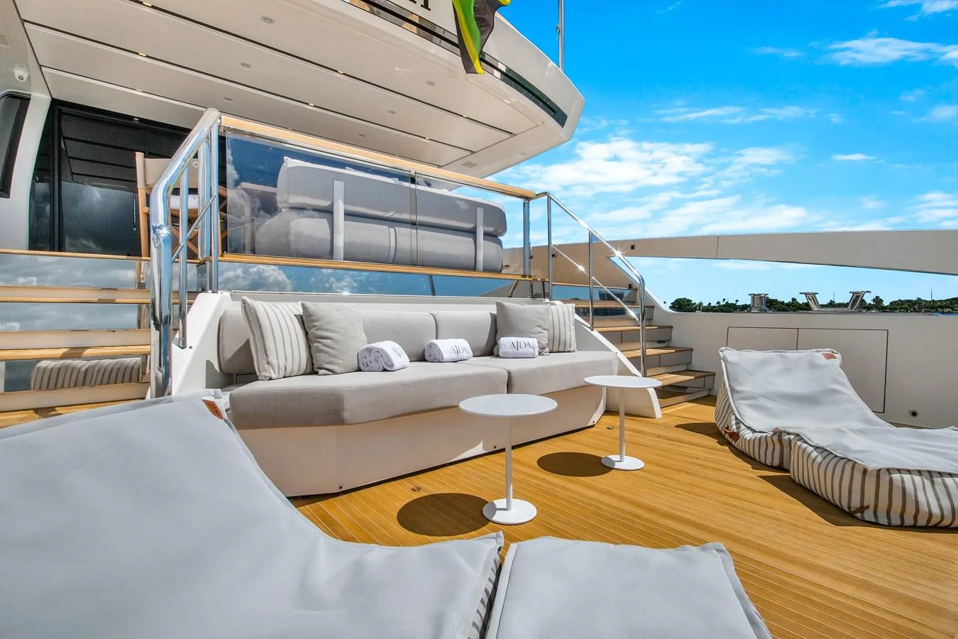 The sundeck offers a luxurious outdoor lounging area with comfortable seating and stunning views. aboard AIDA Yacht for Sale