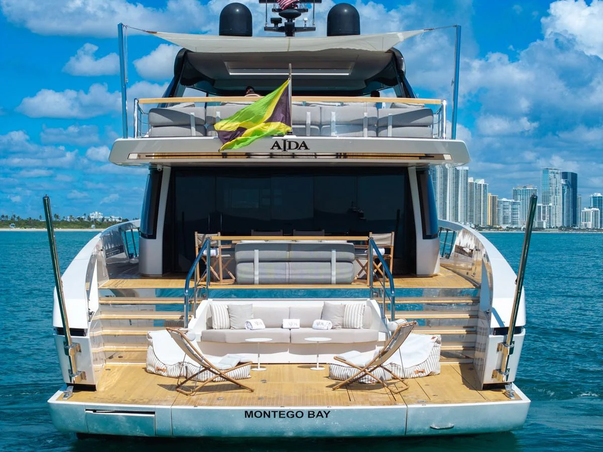 The yacht features a spacious aft deck with comfortable seating and a beautiful view of the water. aboard AIDA Yacht for Sale