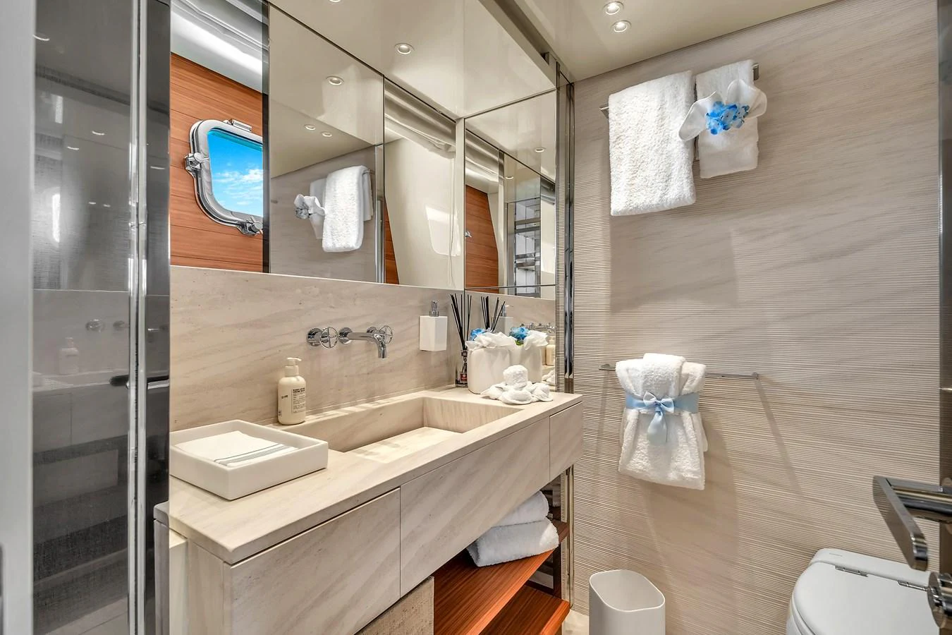The yacht's bathroom features modern fixtures and elegant design elements. aboard AIDA Yacht for Sale
