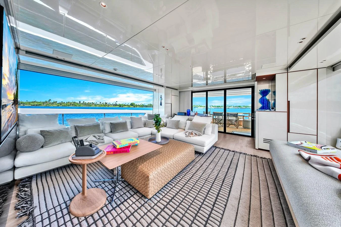 The salon offers a spacious and luxurious seating area with panoramic views. aboard AIDA Yacht for Sale