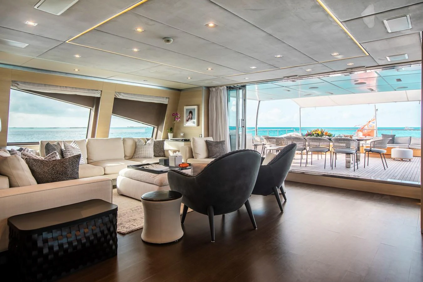 The spacious salon offers luxurious seating with a seamless transition to the outdoor deck, perfect for relaxation and entertainment. aboard EMINA Yacht for Sale
