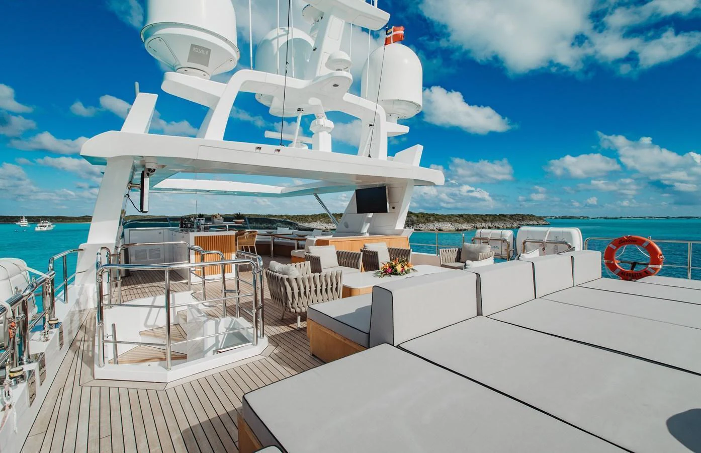 The sundeck offers luxurious lounging areas with stunning ocean views. aboard EMINA Yacht for Sale