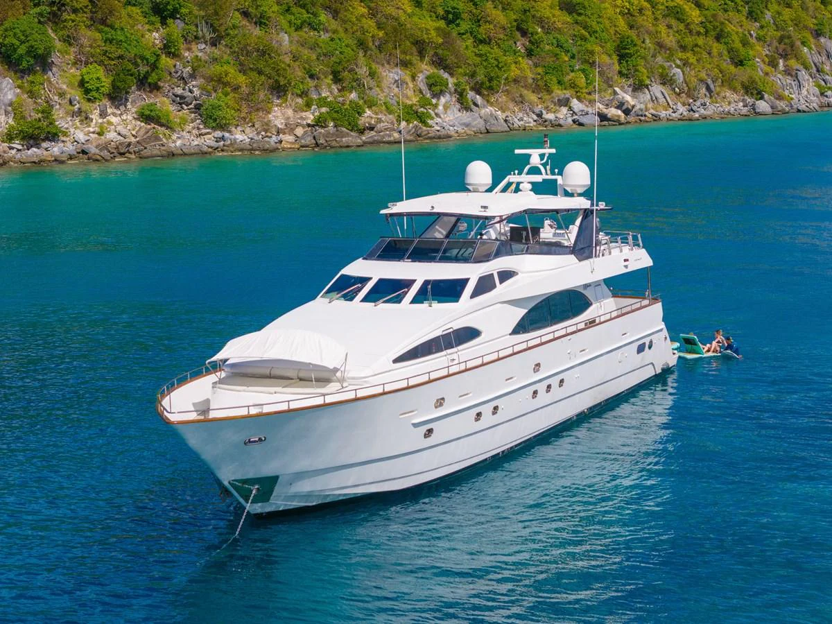 a white yacht on the water aboard CALAIS Yacht for Sale