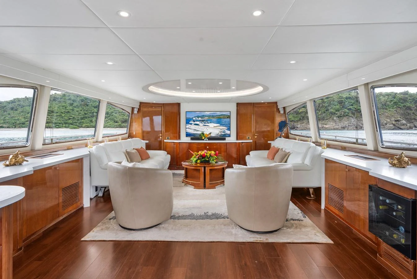 a living room with a large window aboard CALAIS Yacht for Sale