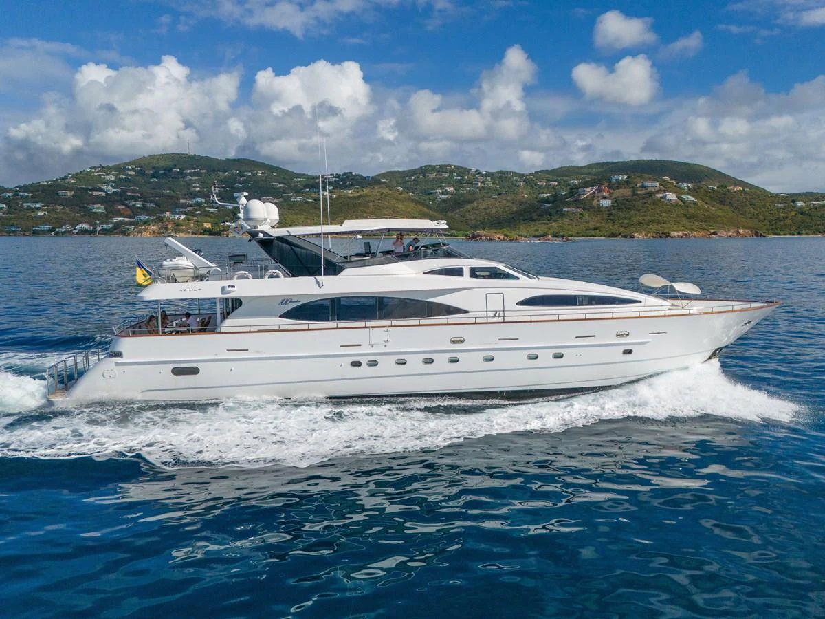 a white yacht on the water aboard CALAIS Yacht for Sale