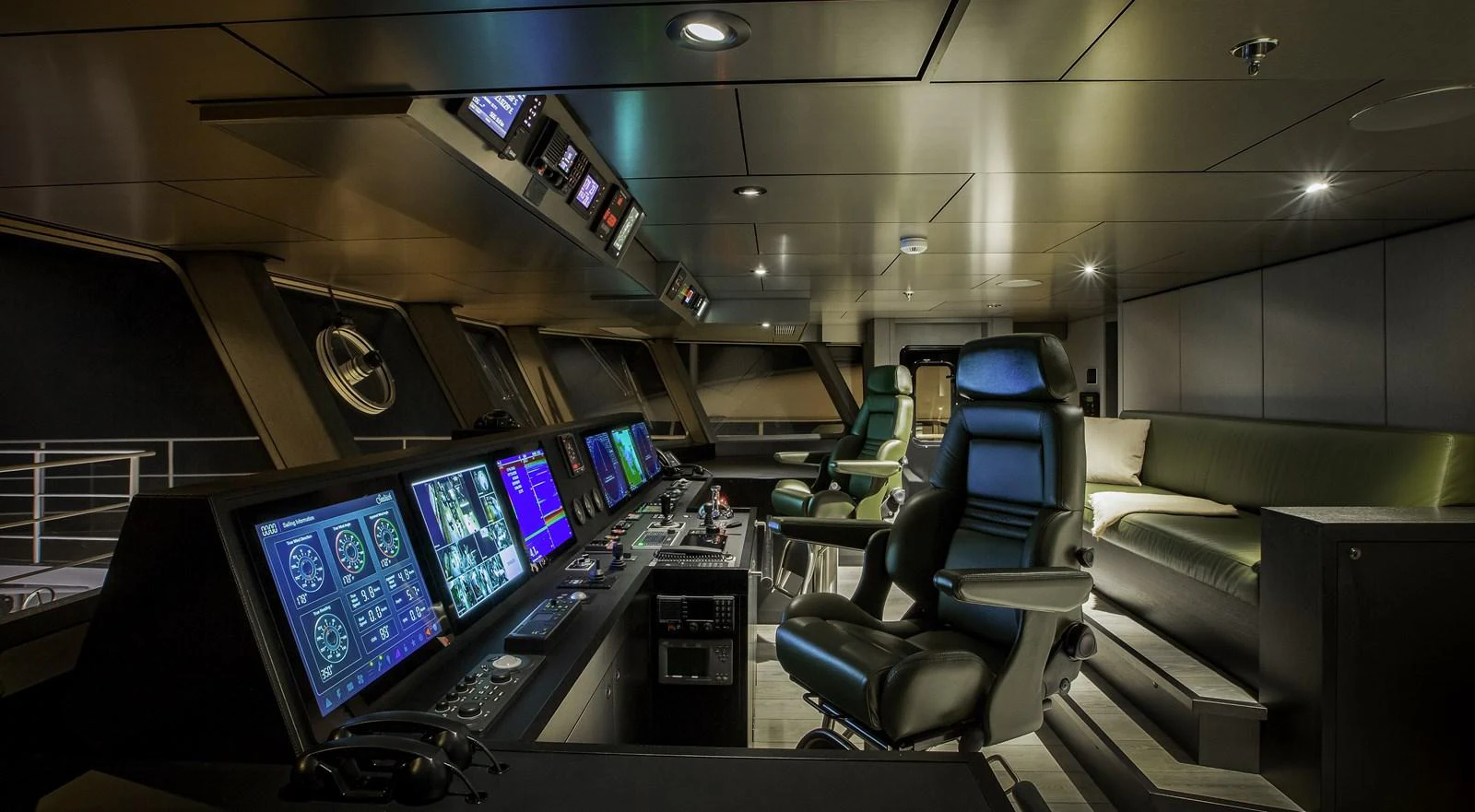 The helm station features advanced navigation equipment and luxurious seating. aboard THE BEAST Yacht for Sale