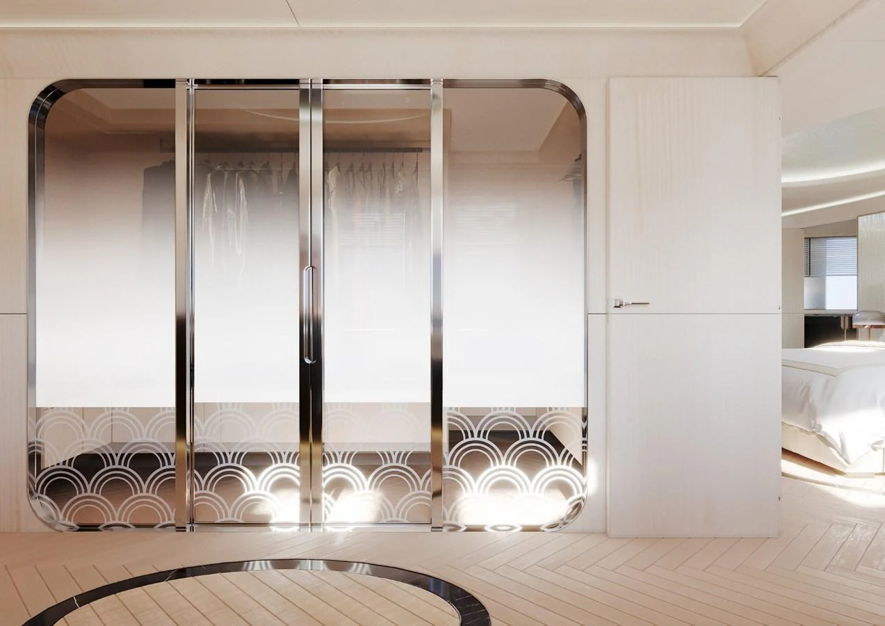 The image showcases a luxurious interior space with elegant sliding doors and a glimpse into a well-appointed bedroom. aboard CLASSICA 40 Yacht for Sale