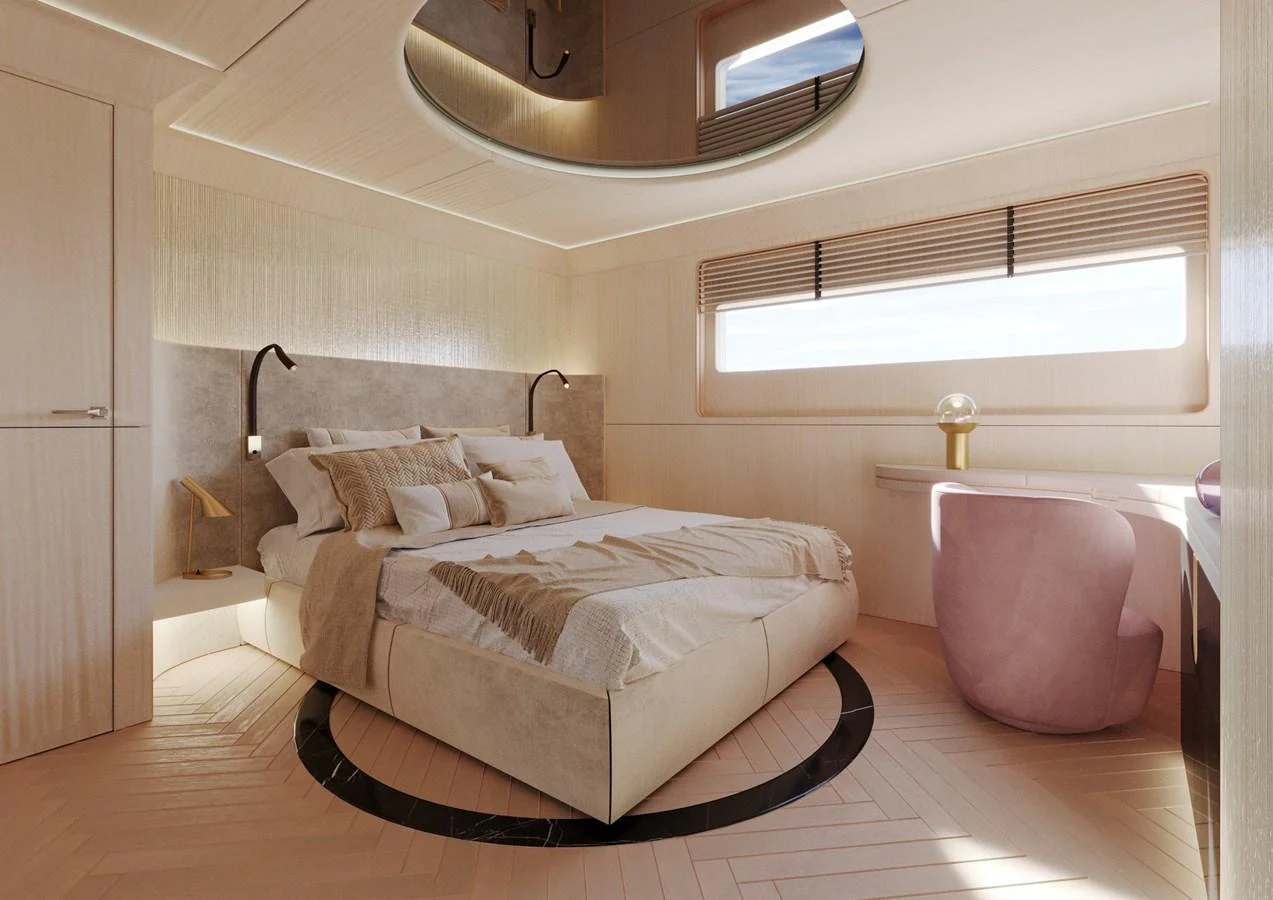 The master stateroom features a luxurious bed, elegant decor, and ample natural light. aboard CLASSICA 40 Yacht for Sale