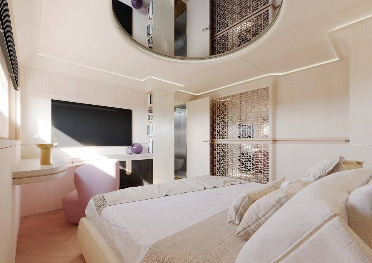 A luxurious stateroom featuring a large bed, modern decor, and ample natural light. aboard CLASSICA 40 Yacht for Sale