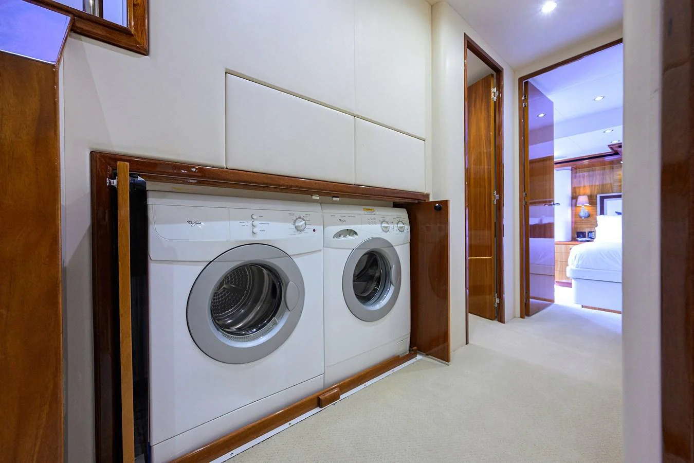 The yacht features a convenient laundry area with modern appliances. aboard SAPPHIRE Yacht for Sale