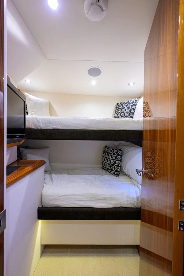 A cozy guest cabin with bunk beds and modern amenities. aboard SAPPHIRE Yacht for Sale