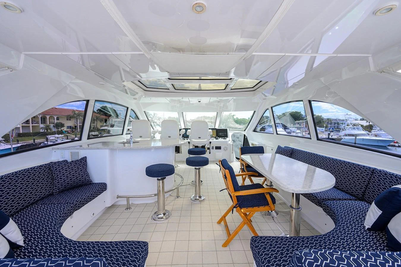 The yacht's salon offers a spacious and stylish seating area with panoramic views. aboard SAPPHIRE Yacht for Sale