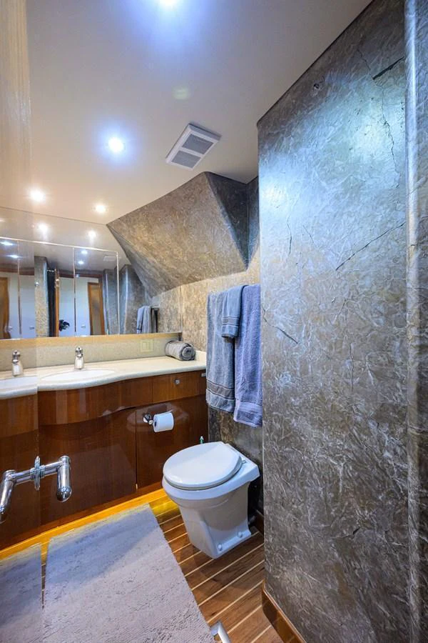 The yacht's bathroom features modern fixtures and elegant finishes. aboard SAPPHIRE Yacht for Sale