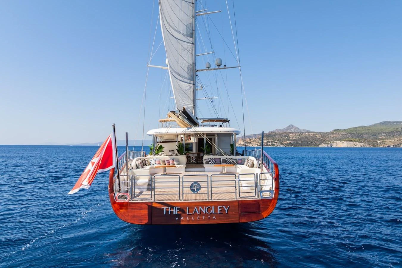 a boat sailing on the sea aboard THE LANGLEY Yacht for Sale