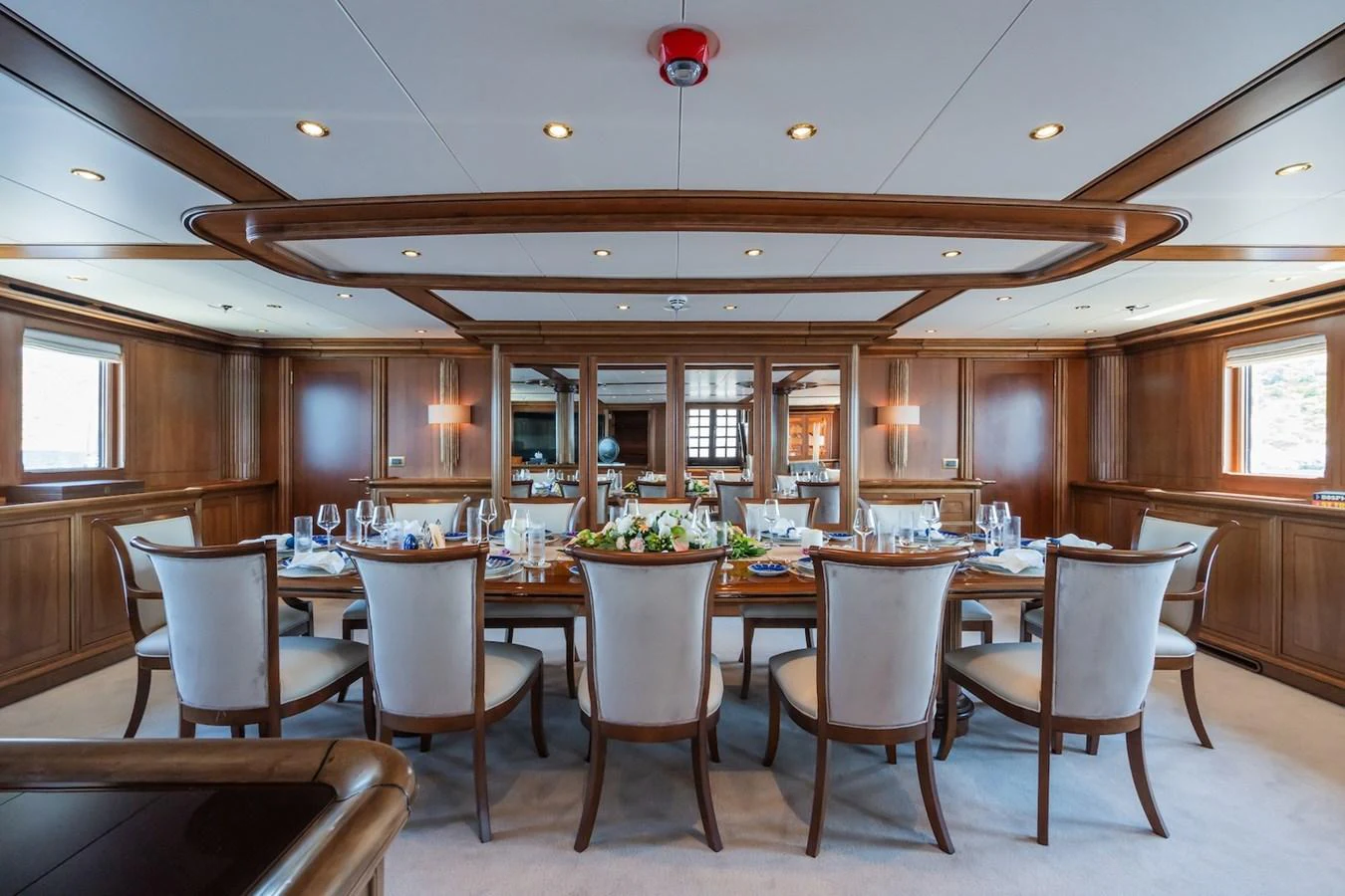 a large kitchen with a dining table aboard THE LANGLEY Yacht for Sale