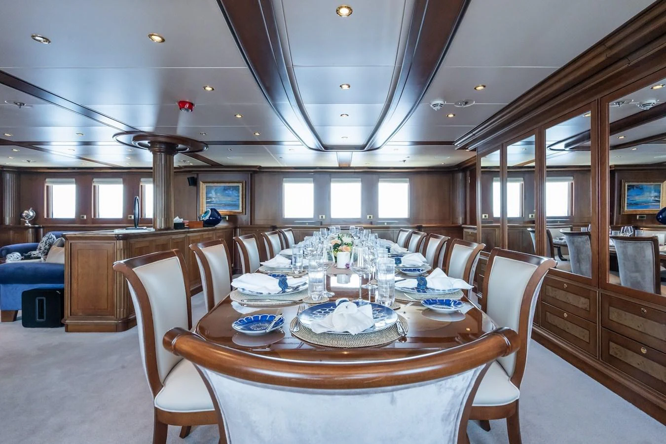 a large dining room with a table and chairs aboard THE LANGLEY Yacht for Sale