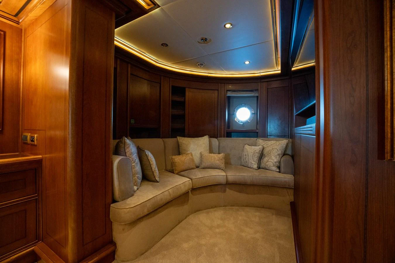 a living room with a couch aboard THE LANGLEY Yacht for Sale