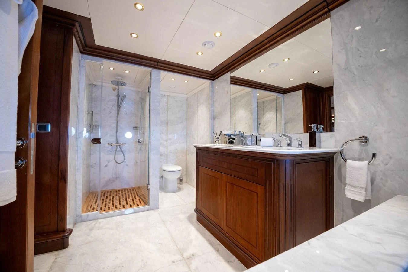 a bathroom with a large mirror aboard THE LANGLEY Yacht for Sale