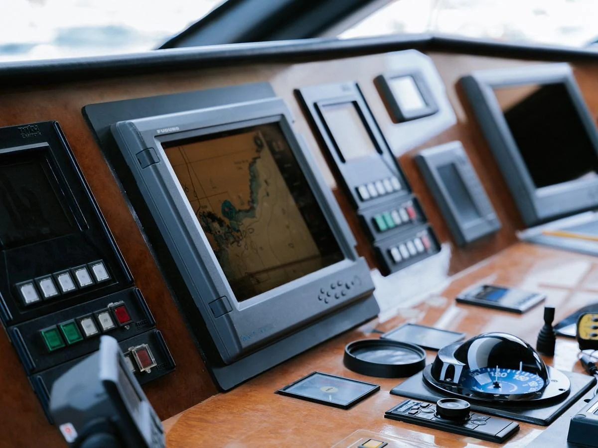 The helm features advanced navigation and control systems for a seamless sailing experience. aboard FRIENDSHIP Yacht for Sale