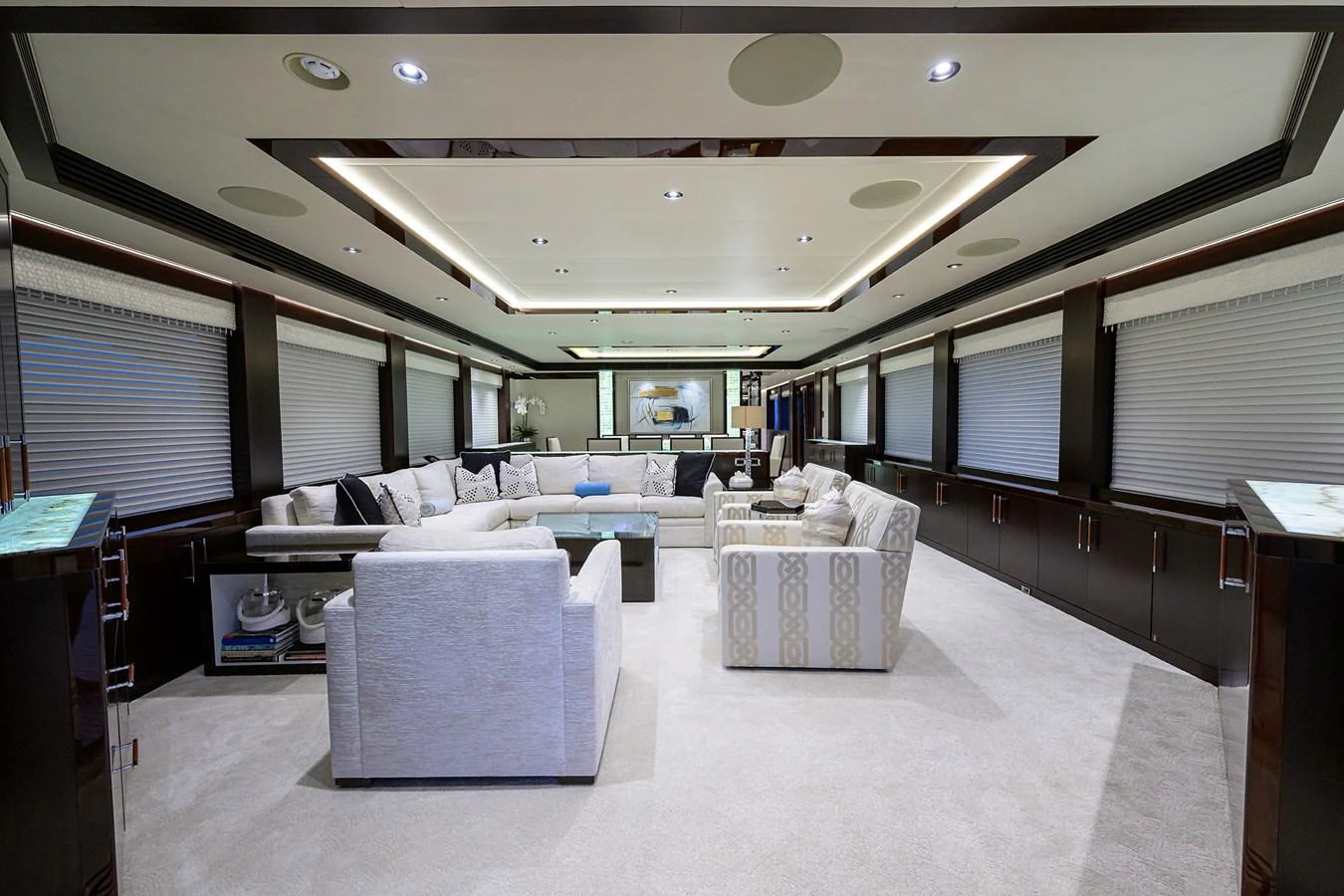 a room with a couch and a table aboard RENNEGADE Yacht for Sale