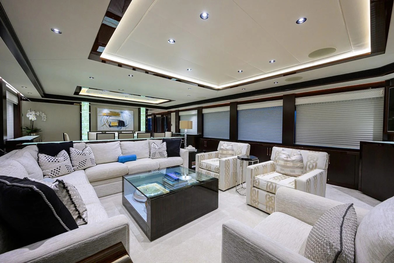 a living room with a large window aboard RENNEGADE Yacht for Sale
