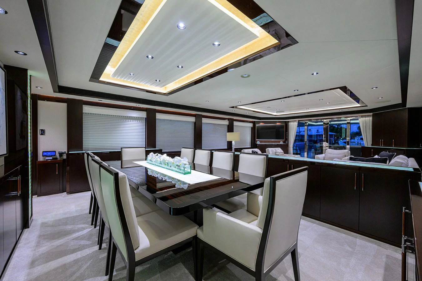 a room with chairs and tables aboard RENNEGADE Yacht for Sale