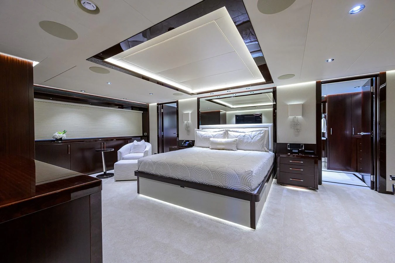 a room with a bed and a desk aboard RENNEGADE Yacht for Sale