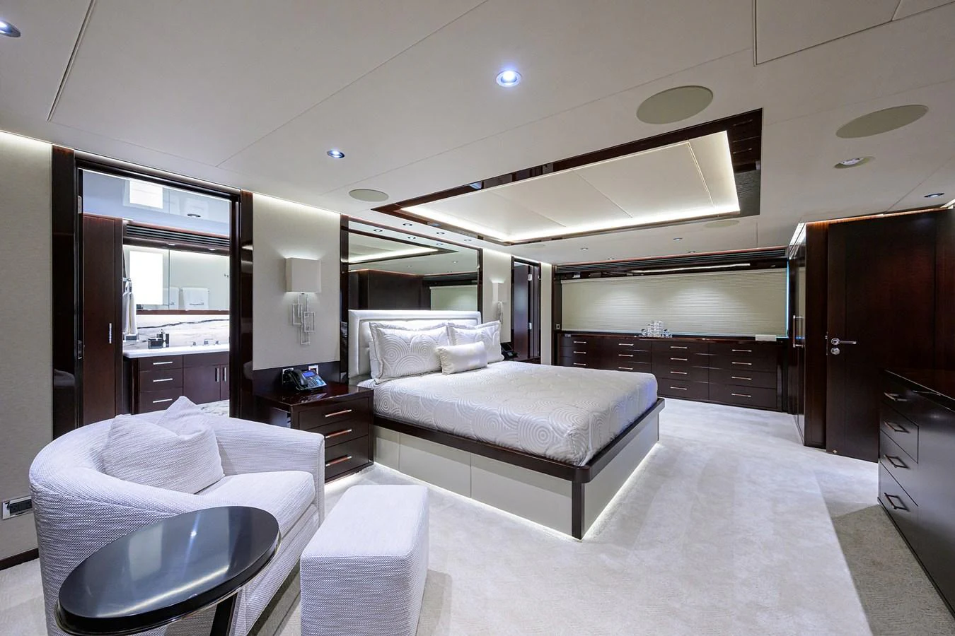 a room with a bed and a desk aboard RENNEGADE Yacht for Sale