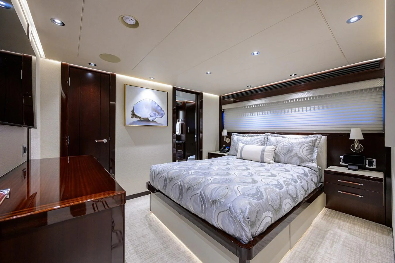 a large bedroom with a large bed aboard RENNEGADE Yacht for Sale