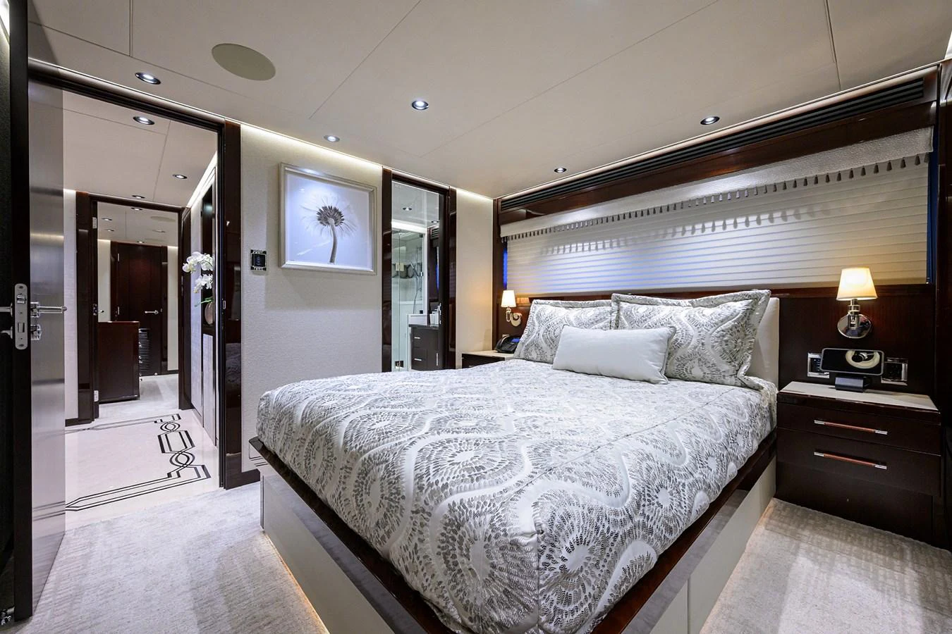 a large bedroom with a large bed aboard RENNEGADE Yacht for Sale