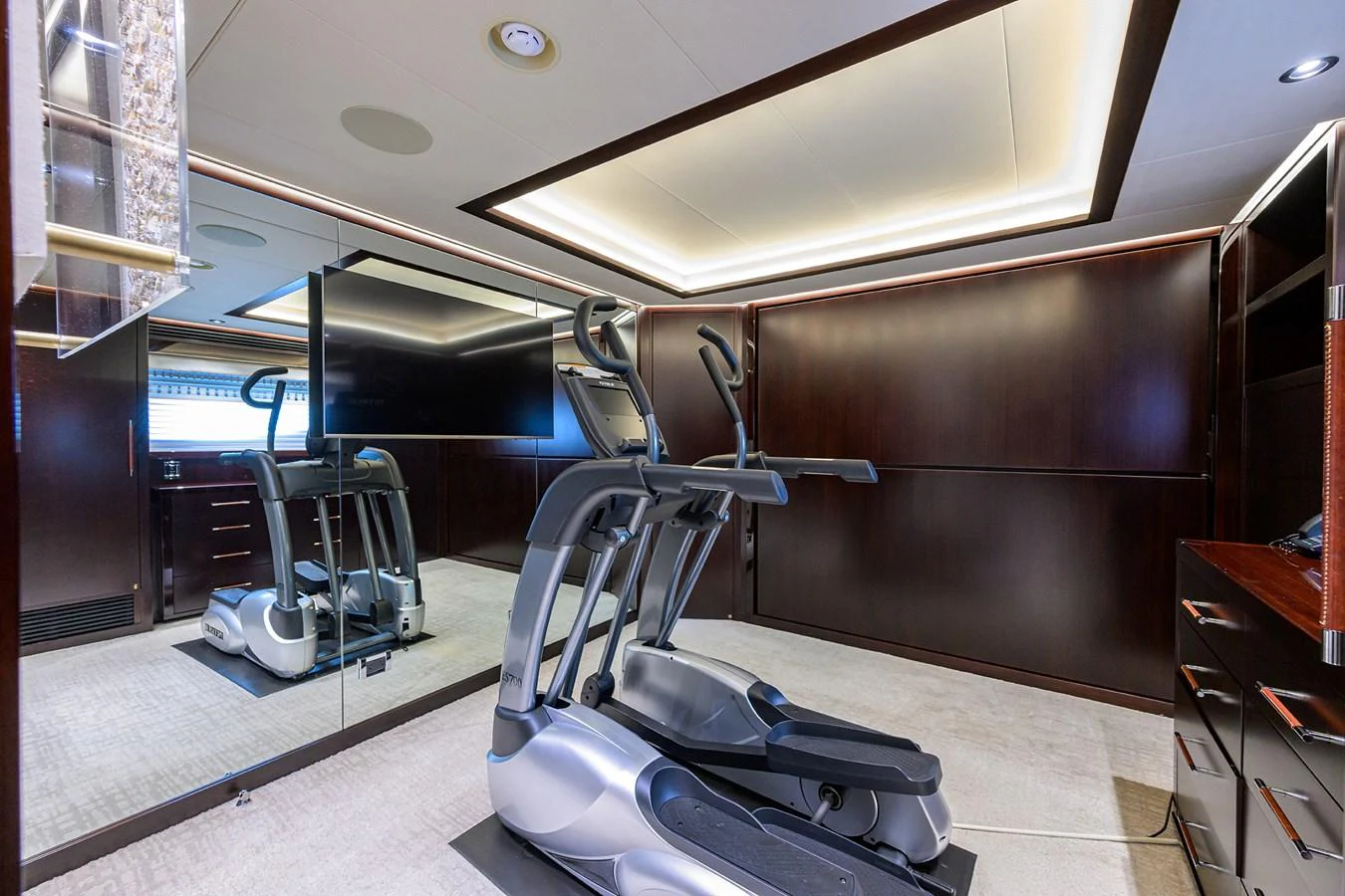 a gym with equipment aboard RENNEGADE Yacht for Sale