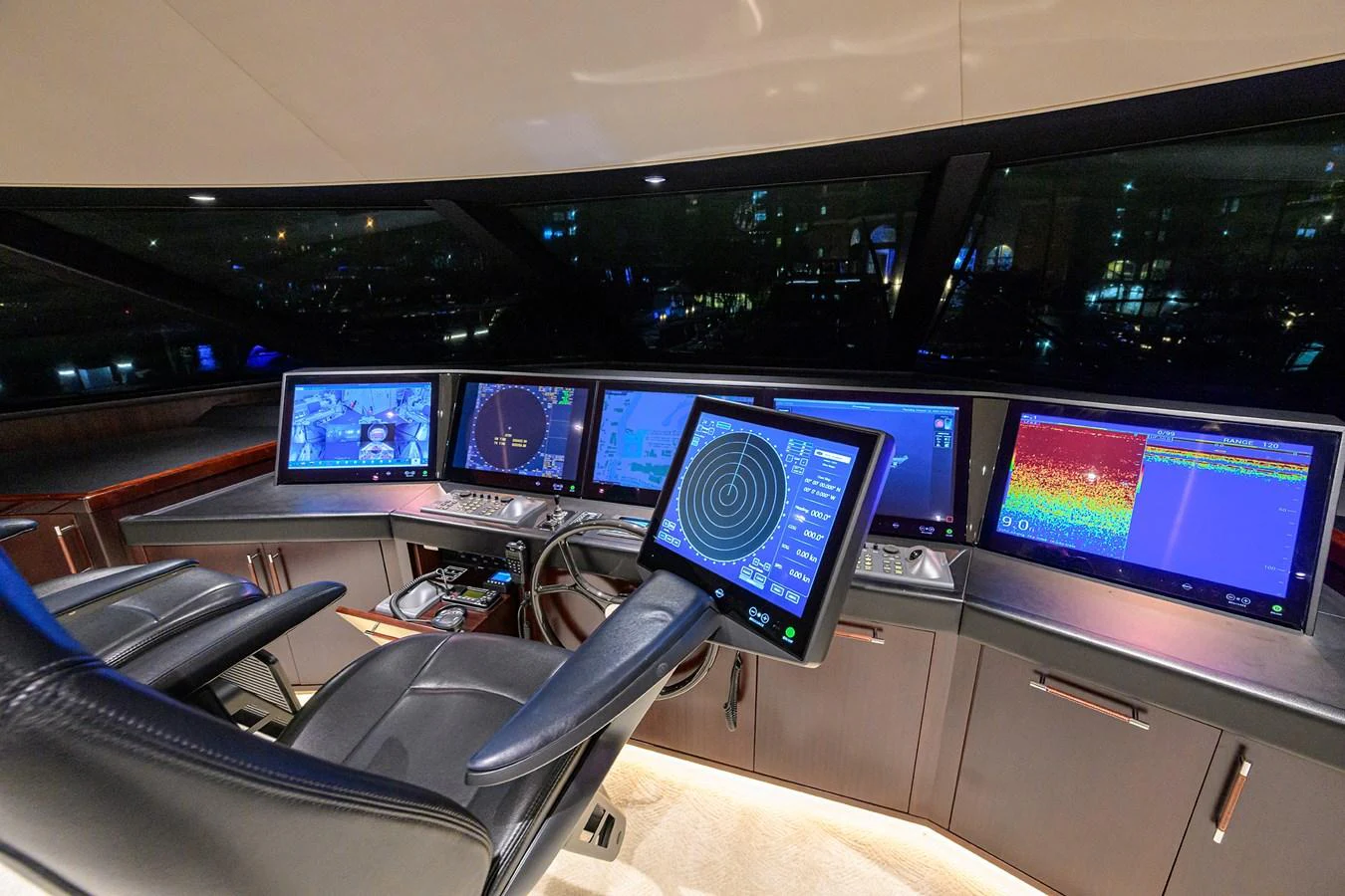 a room with many monitors aboard RENNEGADE Yacht for Sale