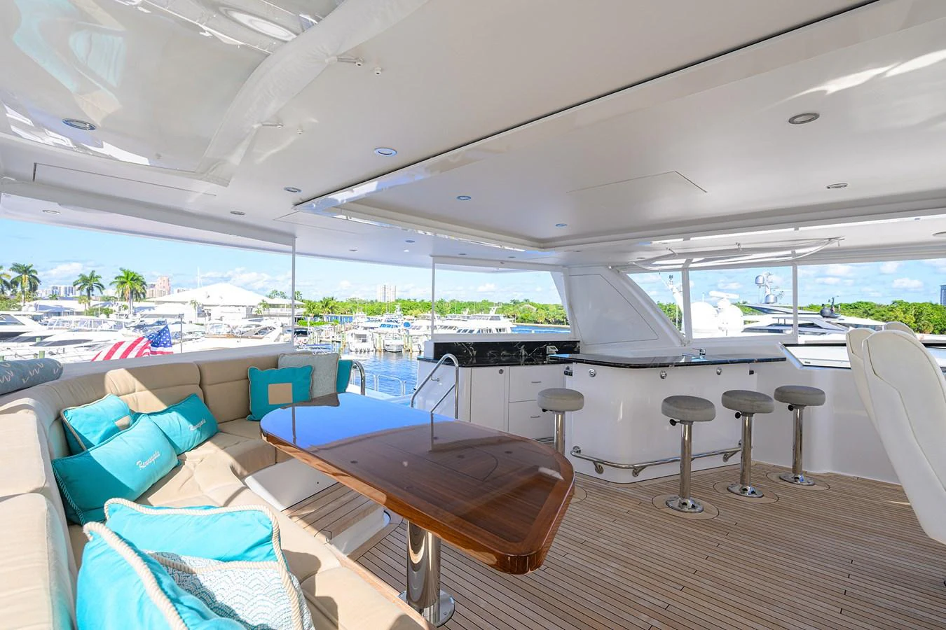 a room with a table and chairs aboard RENNEGADE Yacht for Sale