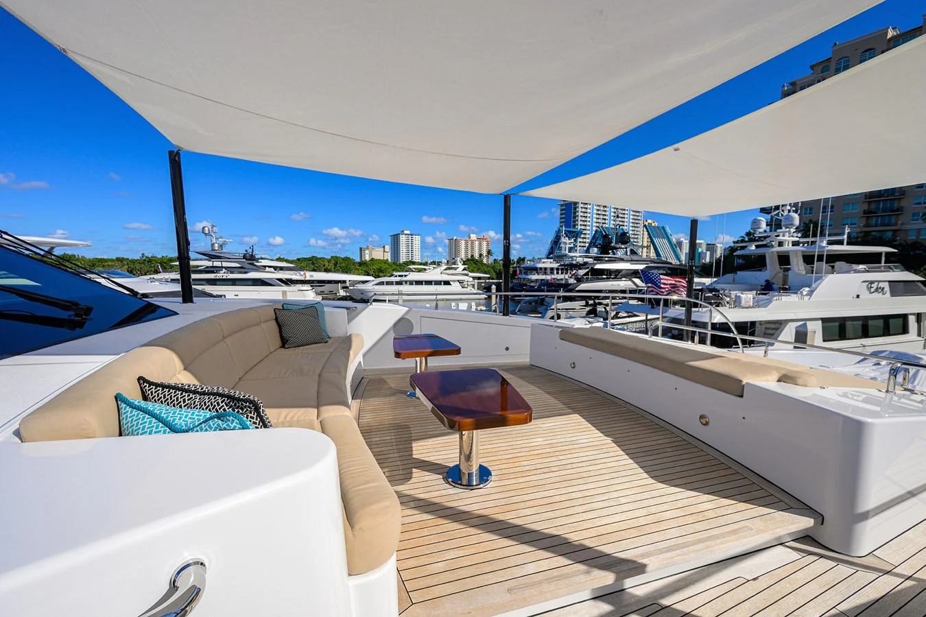 a room with a view of the city and the ocean aboard RENNEGADE Yacht for Sale