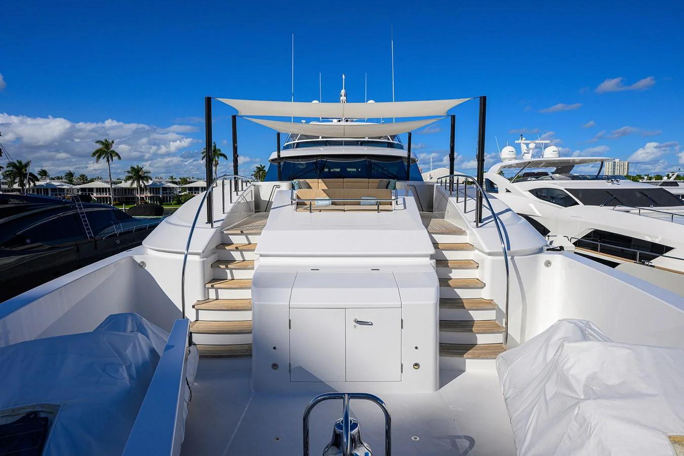 a boat with a white door and a white boat on it aboard RENNEGADE Yacht for Sale