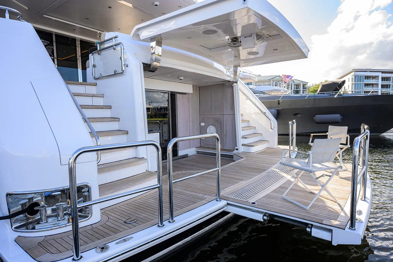 a large white boat with a deck aboard RENNEGADE Yacht for Sale