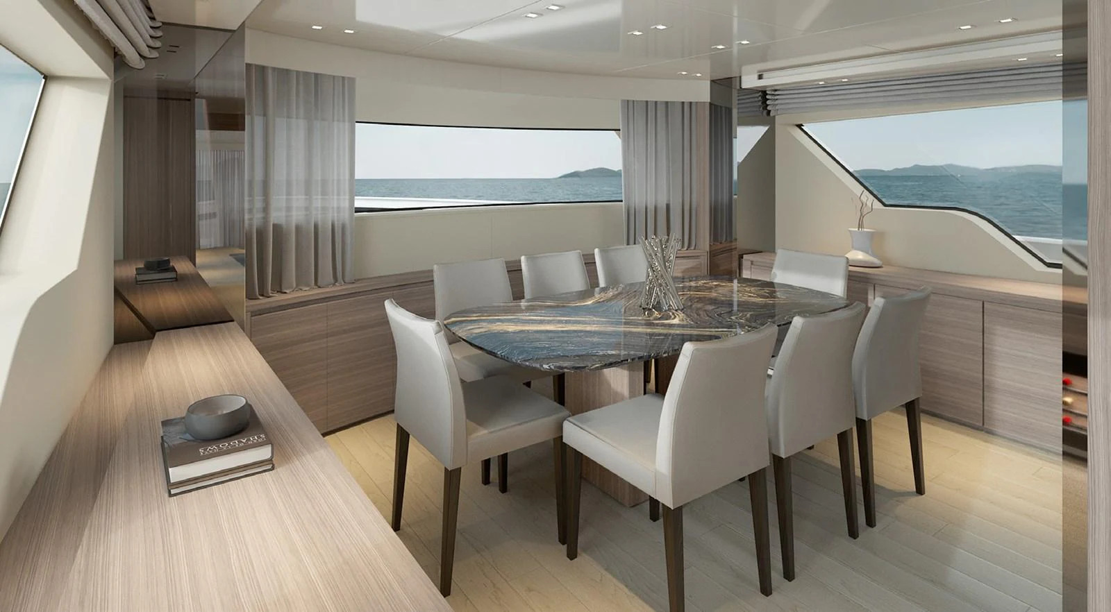 a room with a table and chairs aboard SIXTYFIVE Yacht for Sale