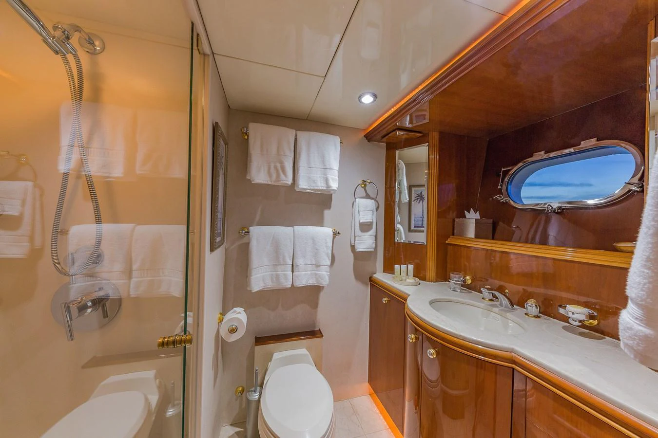 a bathroom with a large mirror aboard AQUA Yacht for Sale
