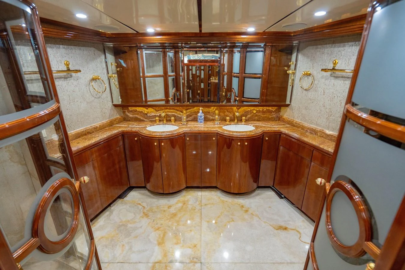 a large room with a table and chairs aboard AQUA Yacht for Sale