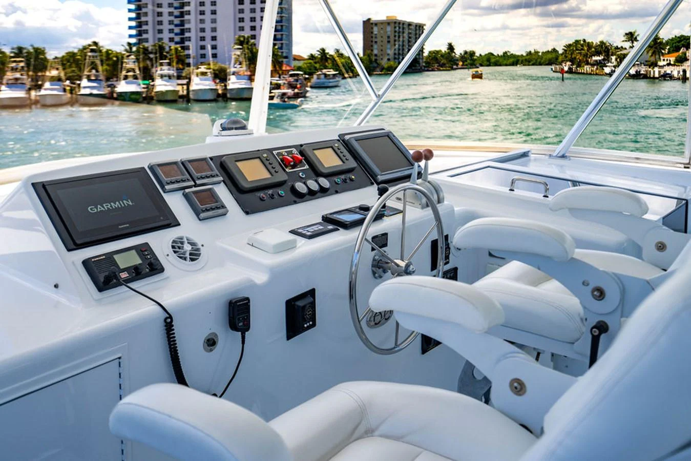 The helm station features advanced navigation equipment and comfortable seating for the captain. aboard WATER BORN Yacht for Sale