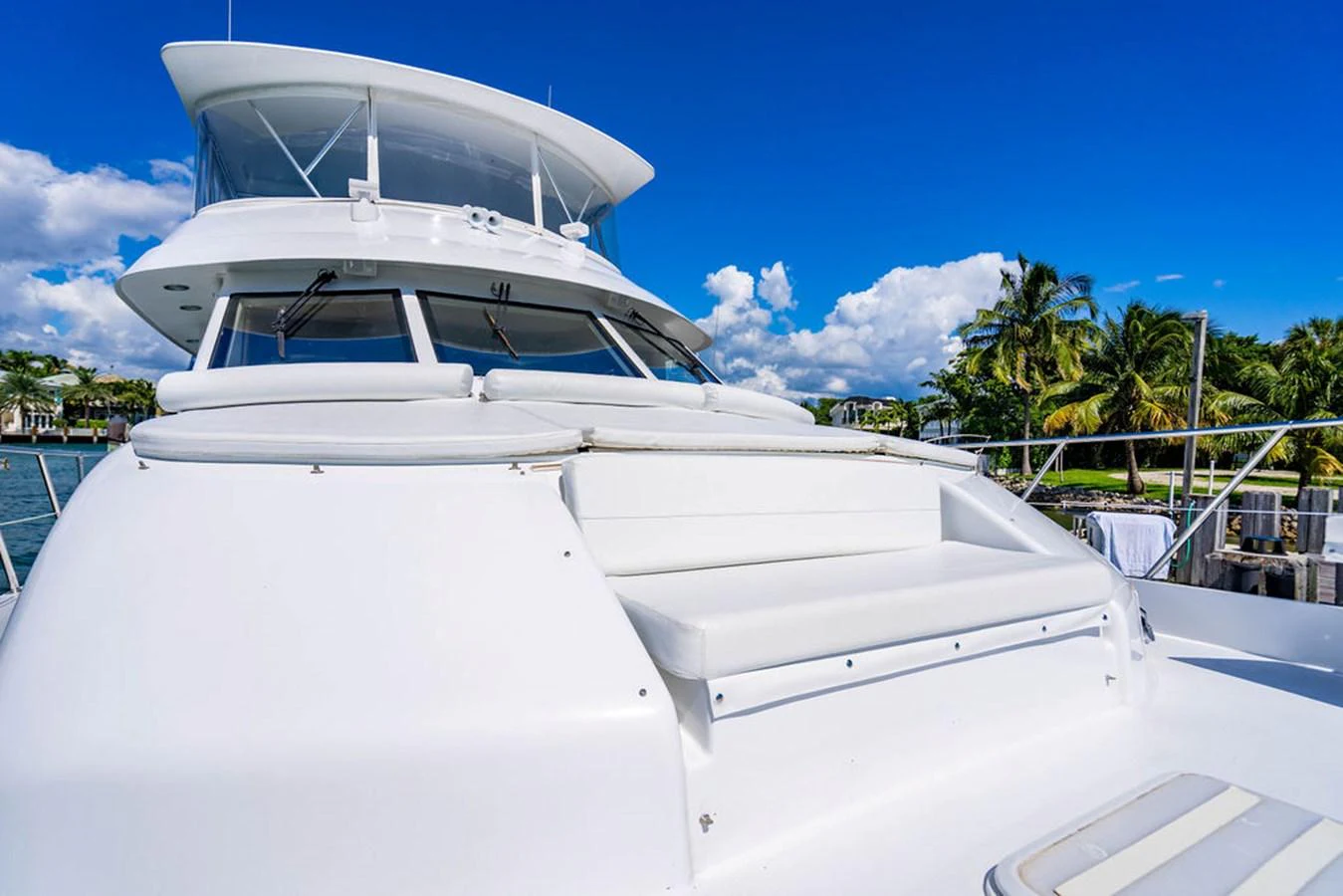 The yacht's bow area features a sleek, modern design with ample seating and a commanding view. aboard WATER BORN Yacht for Sale