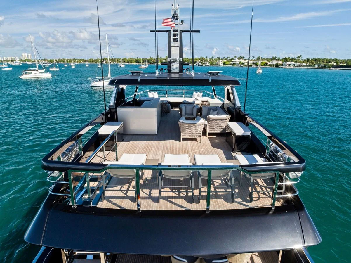 The yacht features a spacious sundeck with ample seating and lounging areas, perfect for relaxation and entertainment. aboard TENACIOUS Yacht for Sale