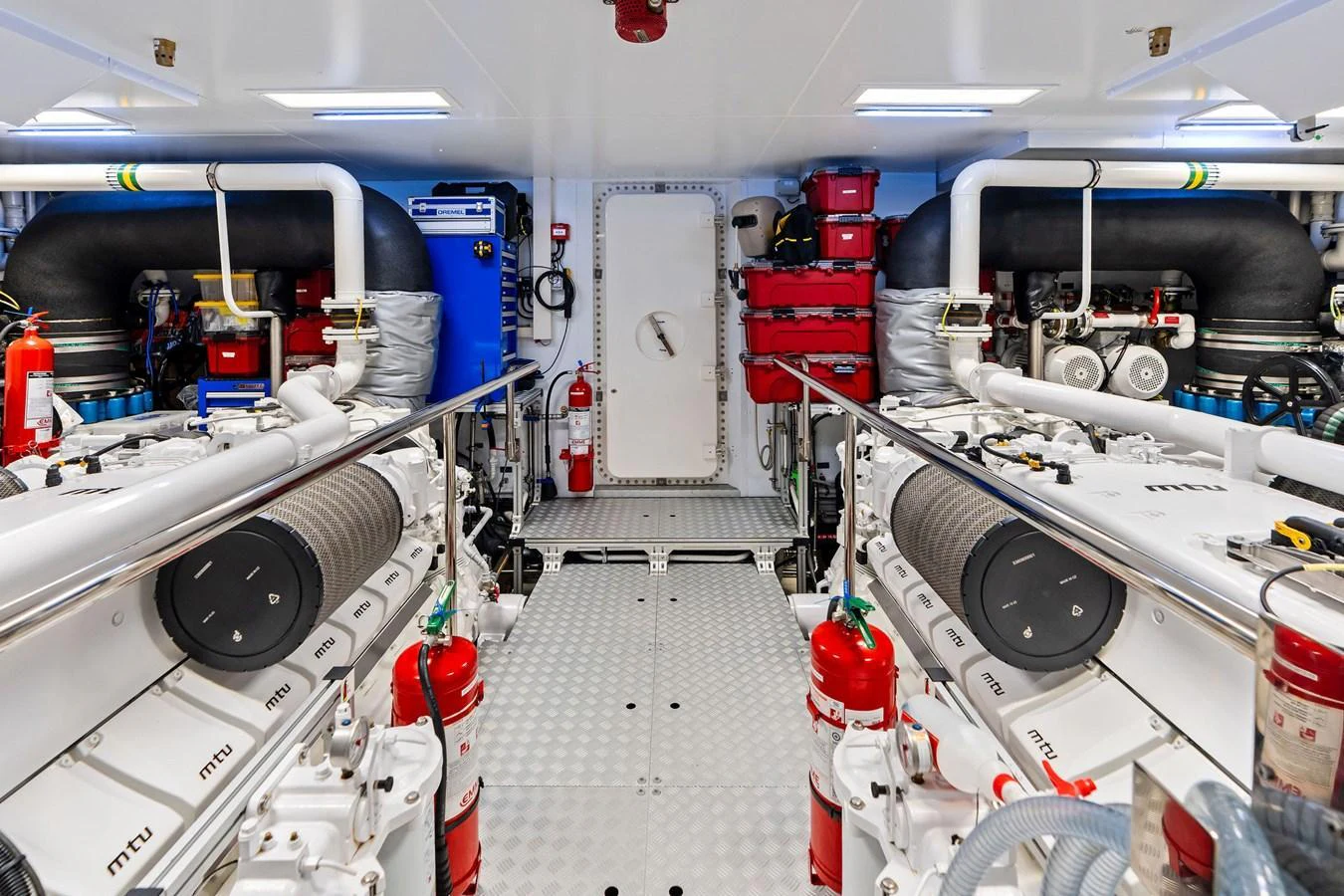 The engine room showcases advanced machinery and equipment for optimal yacht performance. aboard TENACIOUS Yacht for Sale