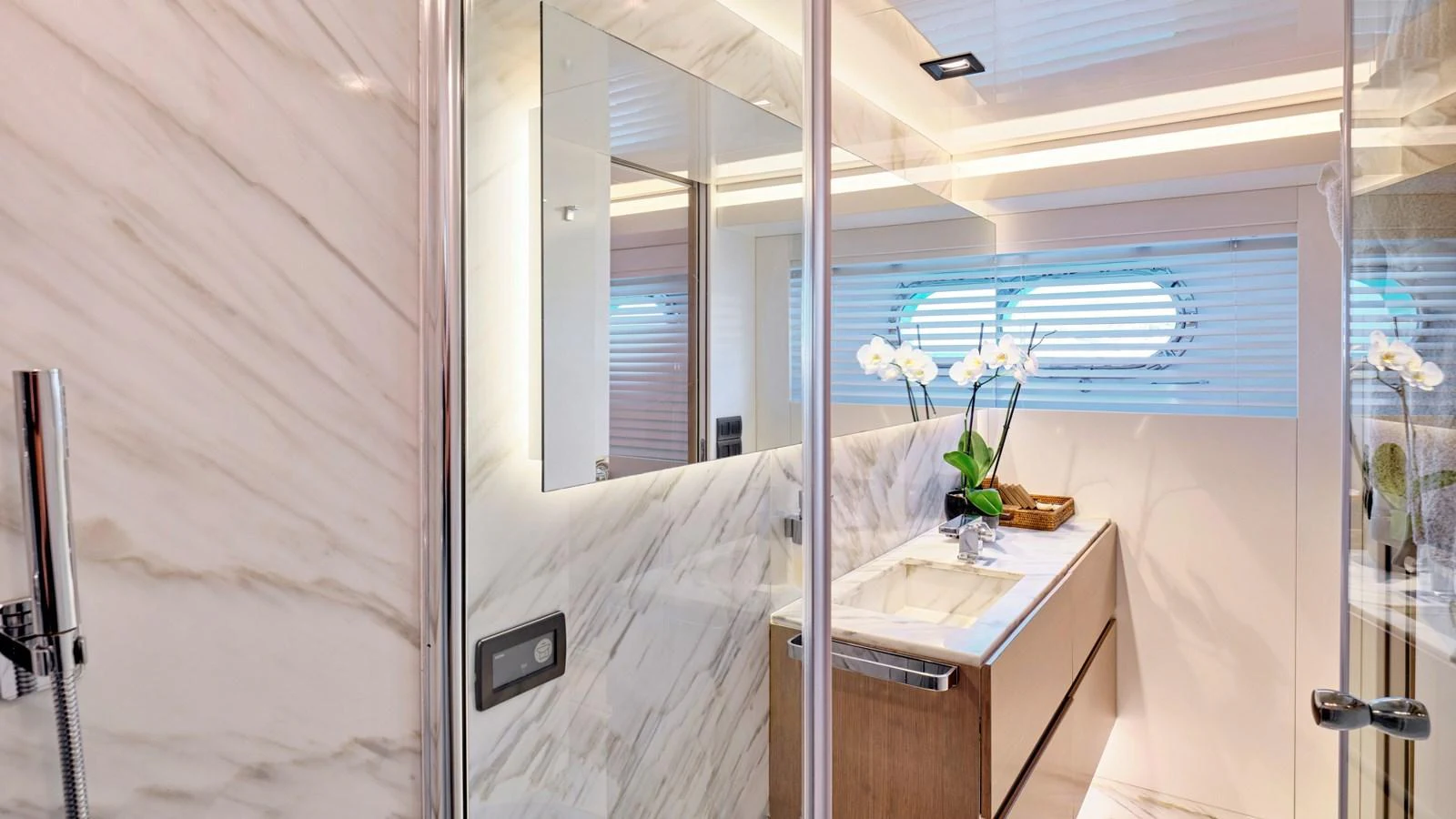 The yacht's bathroom features elegant marble surfaces and modern fixtures. aboard MILGAUSS Yacht for Sale
