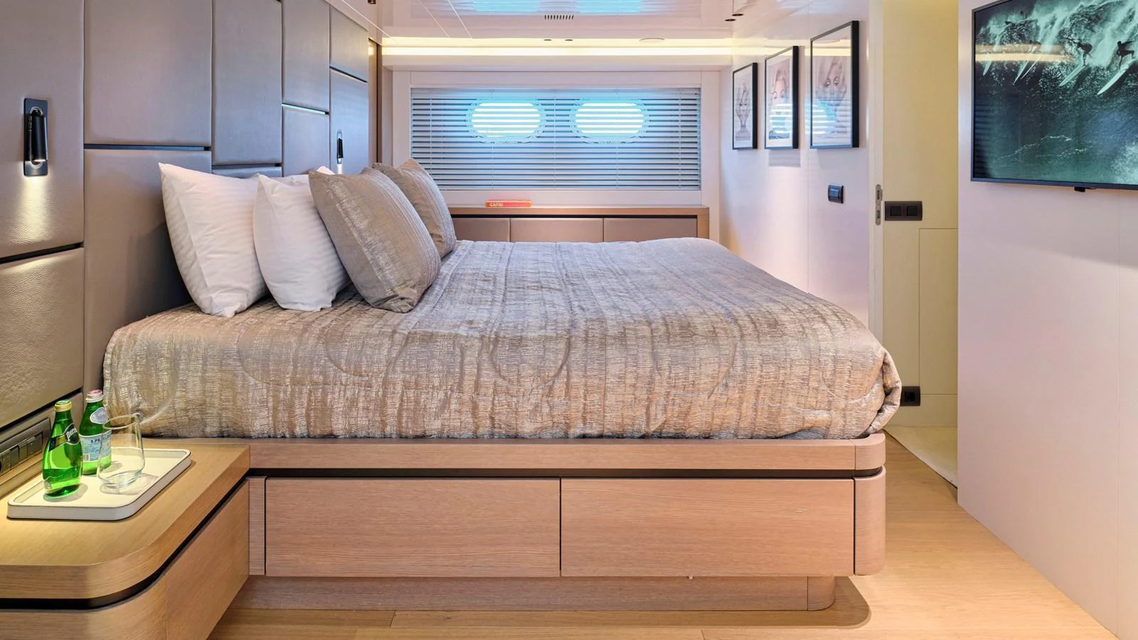 A luxurious stateroom featuring a large bed and modern decor. aboard MILGAUSS Yacht for Sale