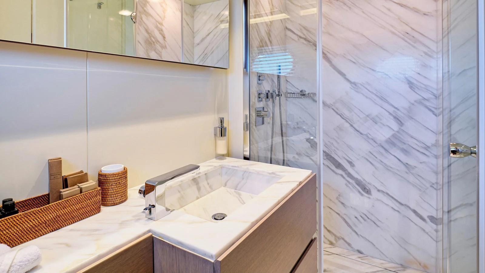 The yacht's bathroom features elegant marble surfaces and modern fixtures. aboard MILGAUSS Yacht for Sale