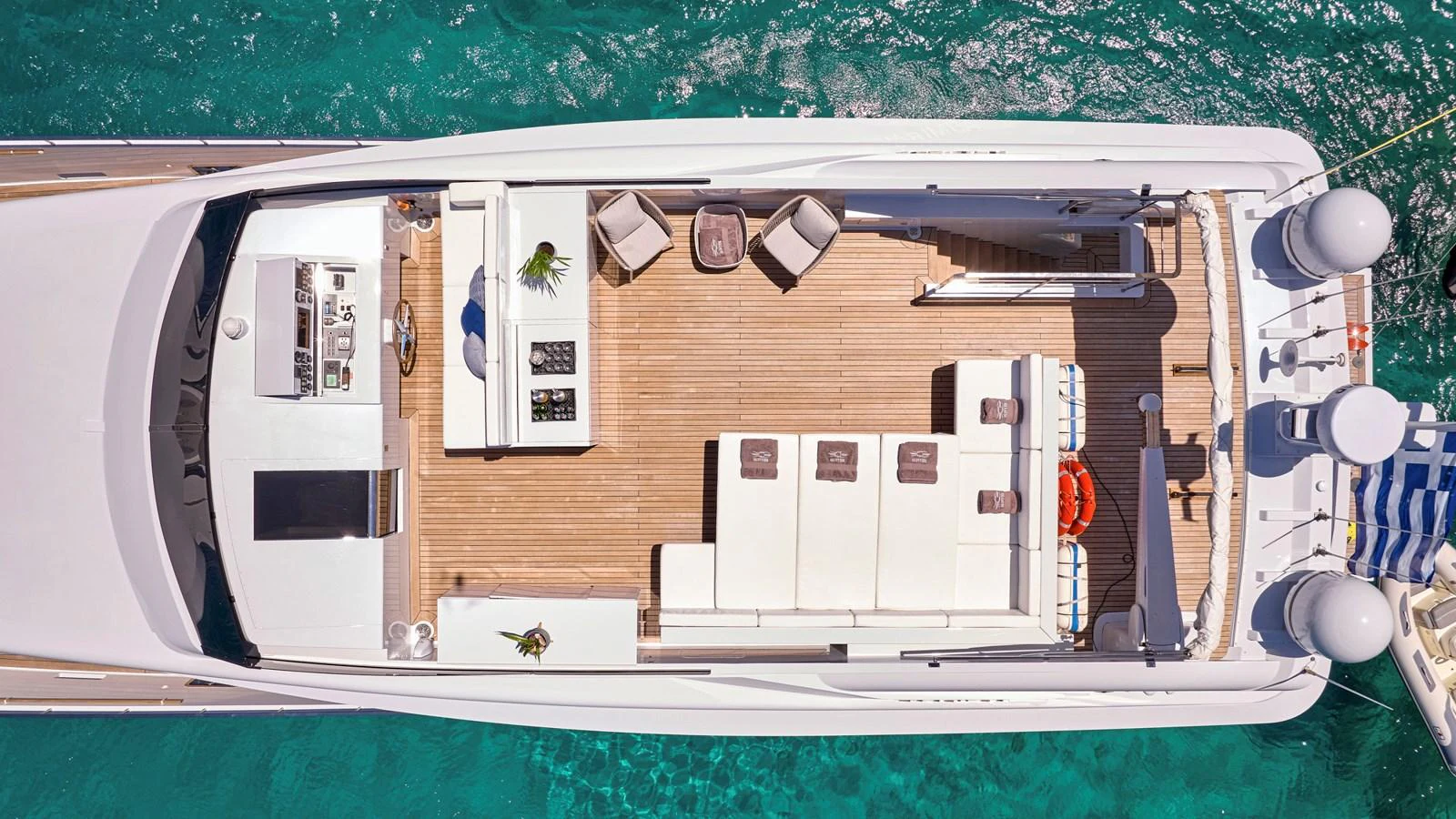 The sundeck offers a spacious and luxurious area for relaxation and entertainment with stunning views of the surrounding waters. aboard MILGAUSS Yacht for Sale