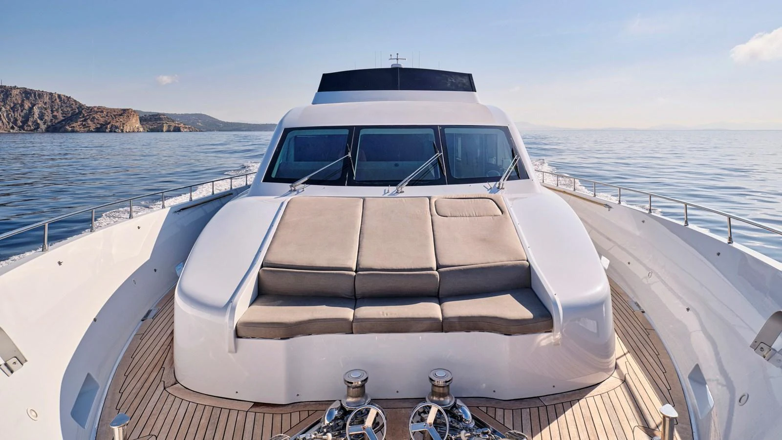 The yacht's foredeck features a spacious sunbathing area with plush cushions, perfect for relaxation. aboard MILGAUSS Yacht for Sale