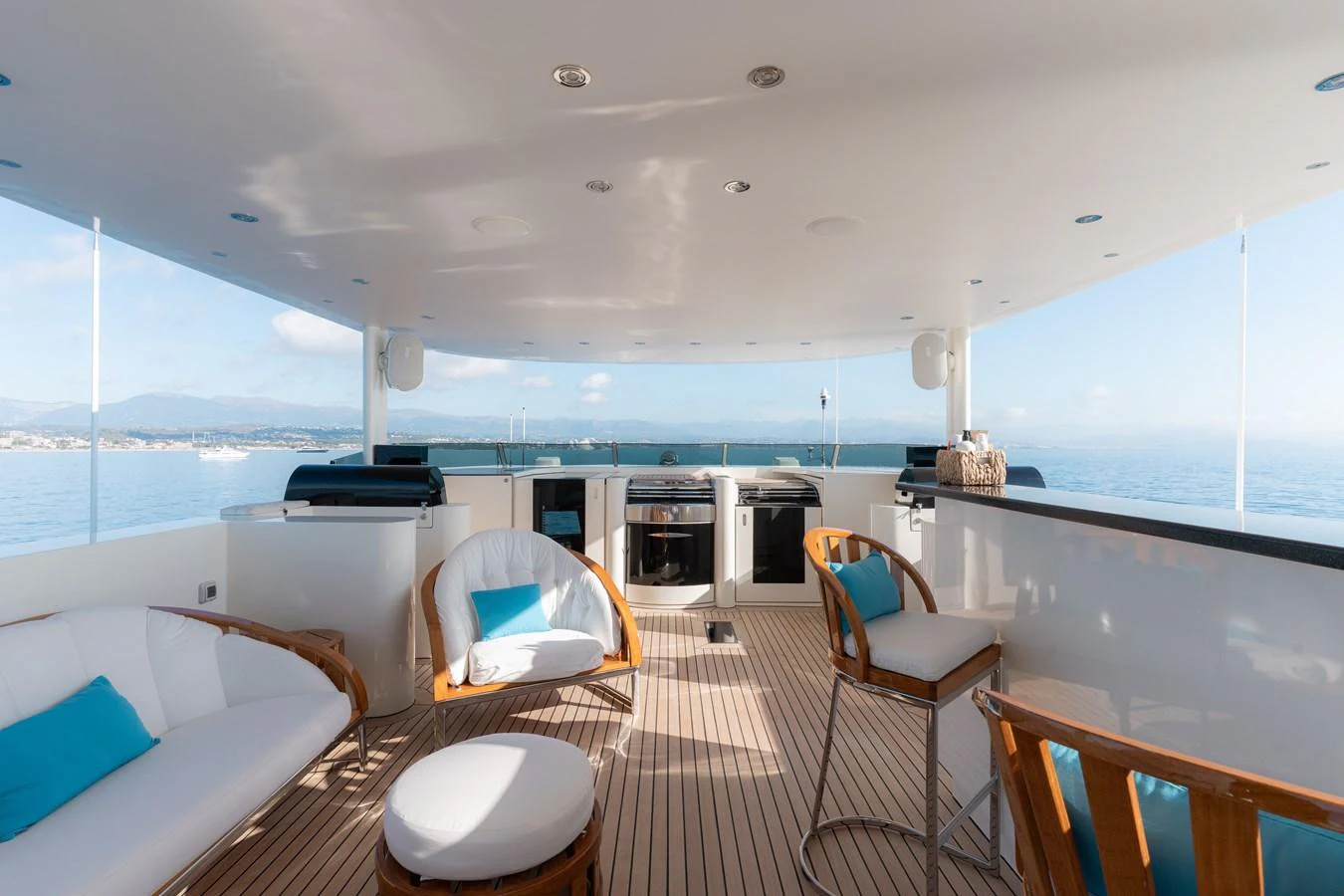 The sundeck offers a relaxing outdoor space with comfortable seating and stunning ocean views. aboard RENEGADE Yacht for Sale